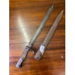 Bayonet in steel sheath