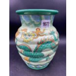 A Charlotte Rhead vase decorated with a fantasy Dragon, 8" high