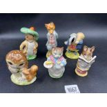 A group of six Beatrix Potter figures