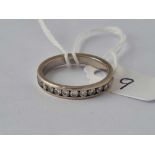 A WHITE GOLD DIAMOND HALF-ETERNITY RING, 14ct, size N, 3.3 g.