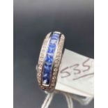 A WHITE GOLD DIAMOND AND SAPPHIRE THREE TIERED BAND RING 9CT SIZE M 4.6 GMS
