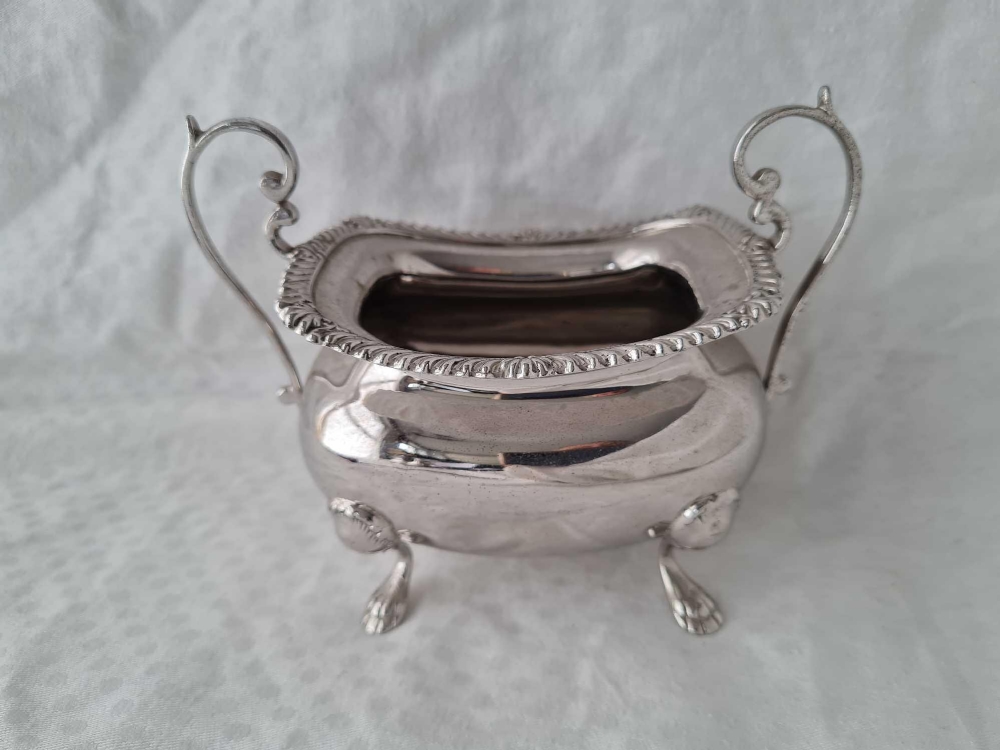 A two handled sugar bowl on four pad feet, marks rubbed, Birmingham 1905, 220 g. - Image 2 of 2