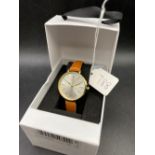 A Quartz Accurist wrist watch in box as new