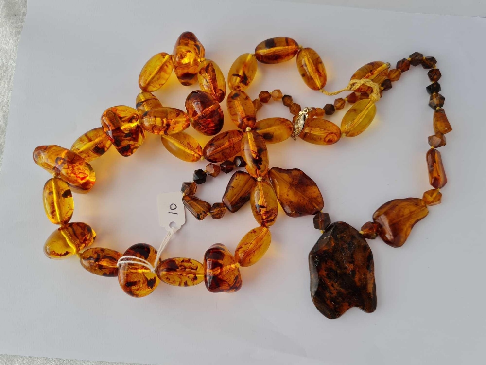 Two large strings of Baltic amber