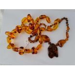 Two large strings of Baltic amber