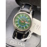 A gents Pulsar Citizen wrist watch with seconds dial and date aperture in box as new