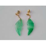 A pair Chinese gold and jade fish design earrings, 14ct