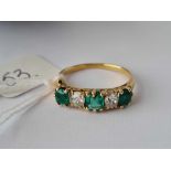 A VICTORIAN EMERALD (1.5 CARAT) AND DIAMOND (0.50 CARAT) 5 STONE RING, 18ct, size P, 3.2 g. in