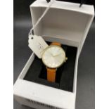 A Quartz Accurist wrist watch in box as new
