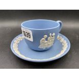 A Wedgwood blue and white cup and saucer