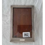 A good rectangular photo frame with engine turned boarder, easel back, 6.5" high, Birmingham 1937 by