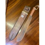 Another knife in leather sheath