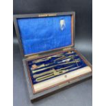 Drawing instruments in a brass inlaid box