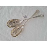 A pair of decorative Georgian spoons, crested with chased decoration, London 1784 by Hester Bateman