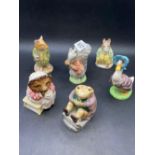 A group of six Beatrix Potter Royal Albert and Beswick figures