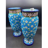 A pair of Longwy blue ground vases, 14" high (AF)