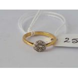 A diamond cluster ring 18ct gold size I 1.9 gms