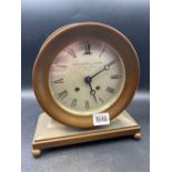 A good quality brass mantel clock with circular dial from the Goldsmith's & Silversmith co.