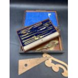 A Rosewood and brass cased set of drawing instruments, 9" wide