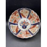 An Imari bowl painted with panels of flowers, 9.5" diameter