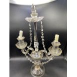 A three light glass candle holder with drops, 8" high