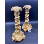 A pair of Rockingham Candlesticks decorated with snakes among vine motif's, 10" high