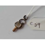 A Georgian gold swivel watch key set agate rose and cross and anchor twin intaglios