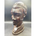 A large African carved hardwood head, 13" high