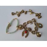 Two charms bracelets together with 9ct jade mounted bracelet