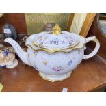 An oval Royal Crown Derby tea pot and cover, painted with festoons, 11" over handles