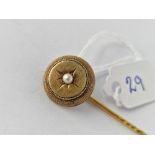 A pearl set stick pin 15ct gold 3.3 gms