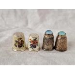 Two silver and enamel thimbles and two others, inset with stones, by HCC & S, Birmingham 1926