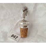 A bottle stopper in form of a Gent standing reading a book, 2" high (800 standard)