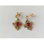 A pair of amber ornate drop earrings 9ct 2.7 gms