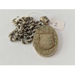 A Victorian silver oval locket on chain 18 inch