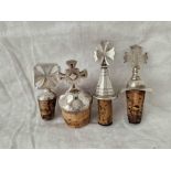 Four more bottle stoppers, surmounted with a Maltese cross