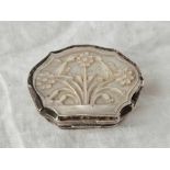 An antique shaped oval snuff box, the base and cover deeply carved with M.O.P, 3" wide