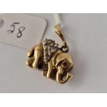 A stone set Elephant charm 9ct 5.7 gms