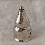 A Georg Jenson pepper with hammered finish, 3.5" high, import mark for London 1925