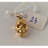 A unusual skull charm pendant 18ct gold 2.1 gms