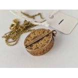 A unusual Victorian magnifying locket on rolled gold chain 18 inch