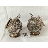 A pair of cauldron shaped Indian silver salts on rim foot, 2" high, 74g