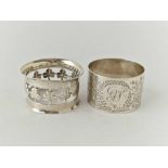 A pierced napkin ring with shamrock motifs, Birmingham 1902 and another engraved London 1893, 41 g.