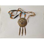 A NAVAHO small disk pendant