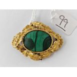 A antique gold mounted malachite brooch 9.7 gms
