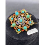 A 19TH CENTURY TURQUOISE AND PEARL BROOCH WITH MULTI COLOURED INTRICATE ENAMELLING DETAIL HIGH