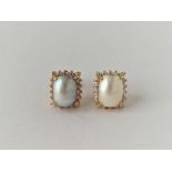 Pair of 22ct mabe pearl earrings 5.5g inc