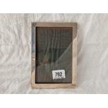 A plain oblong photo frame, 6.5” high, Birmingham 1918 by G&F?