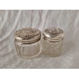 Two embossed silver top jars, one with angel heads, Chester 1907