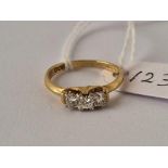 A three stone diamond ring, 18ct, size M